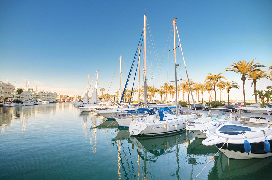 Scenic view of some Yachts in Marina port at dusk in Benalmádena